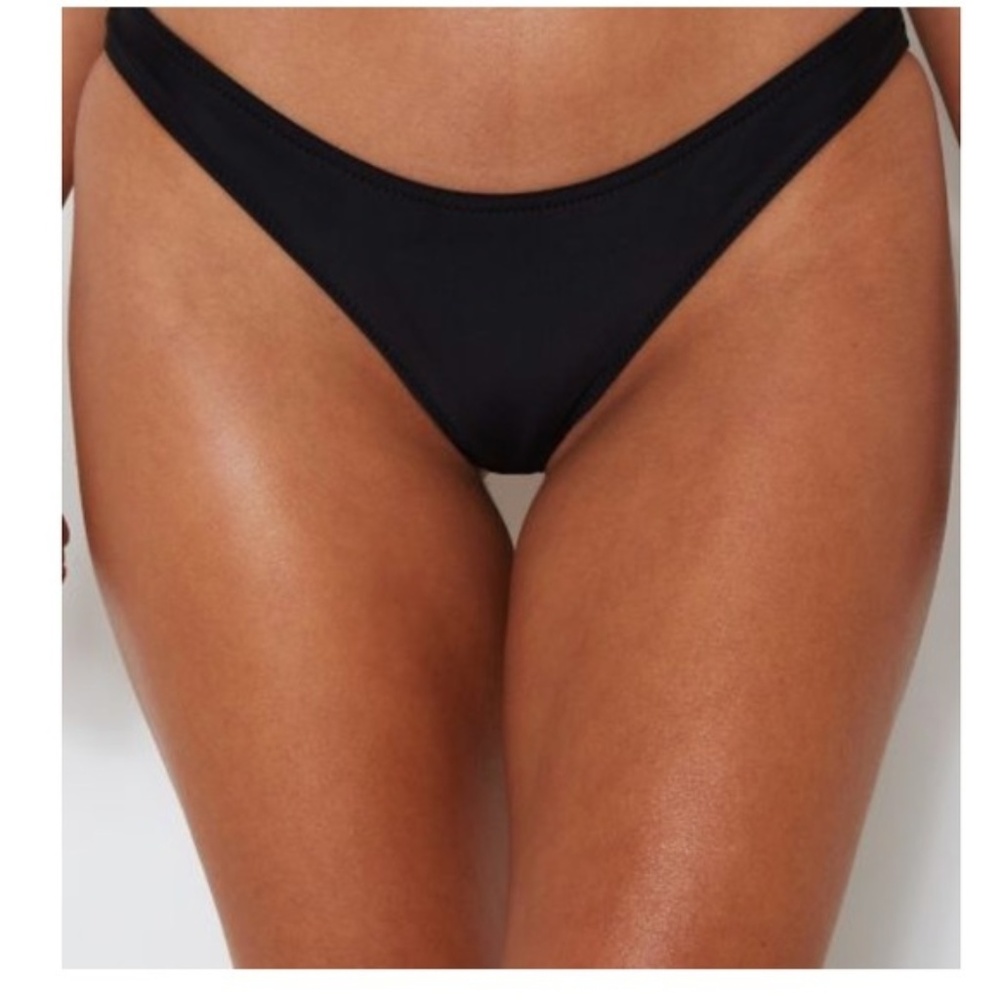 White fox swim black bikini bottoms